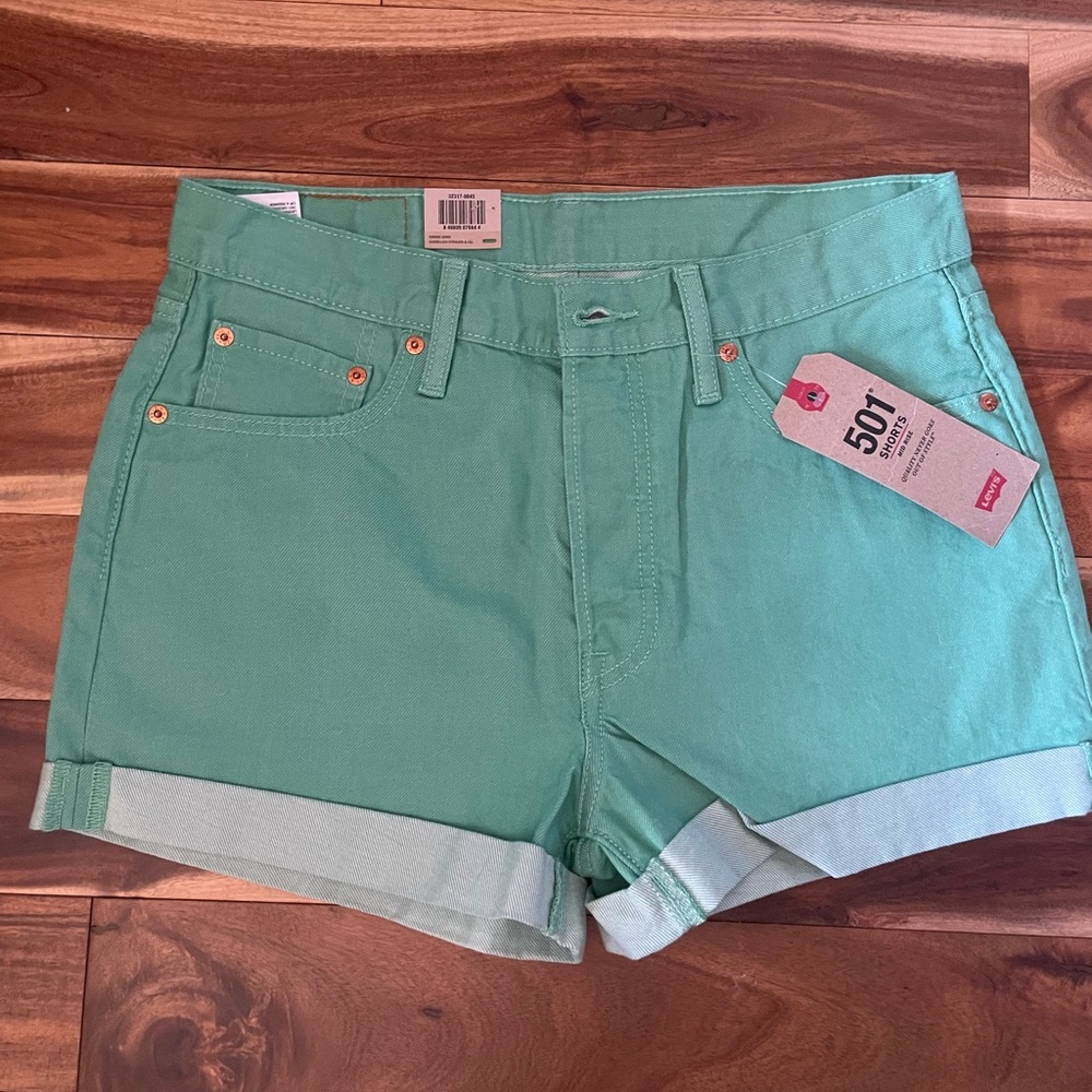 Levi’s seafoam green 501 mid rise Jean shorts